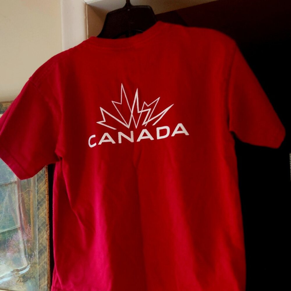 O)lympic gear - Canada believe  no size tags 18 inches wide by 21 inches long